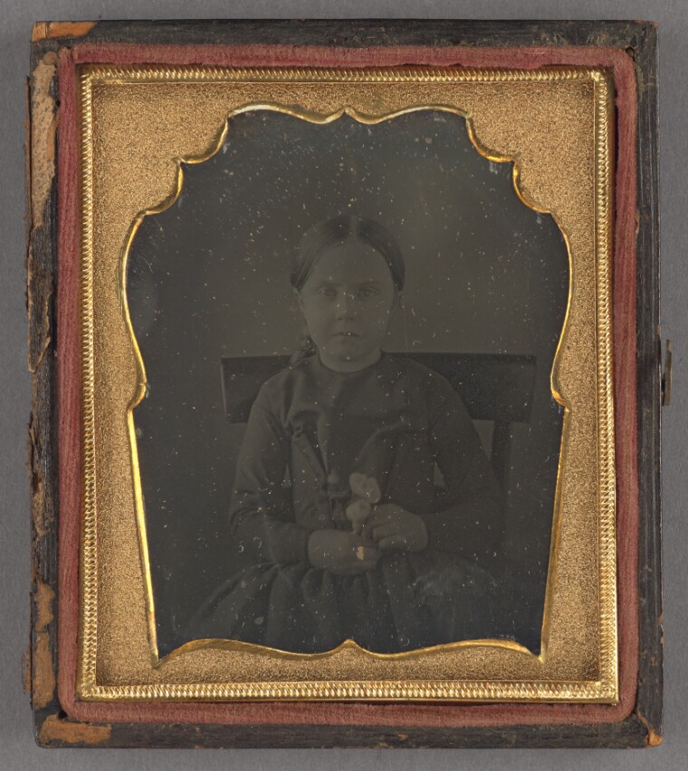 [Portrait of a Seated Girl Holding Some Flowers] (84.XT.1579.24)